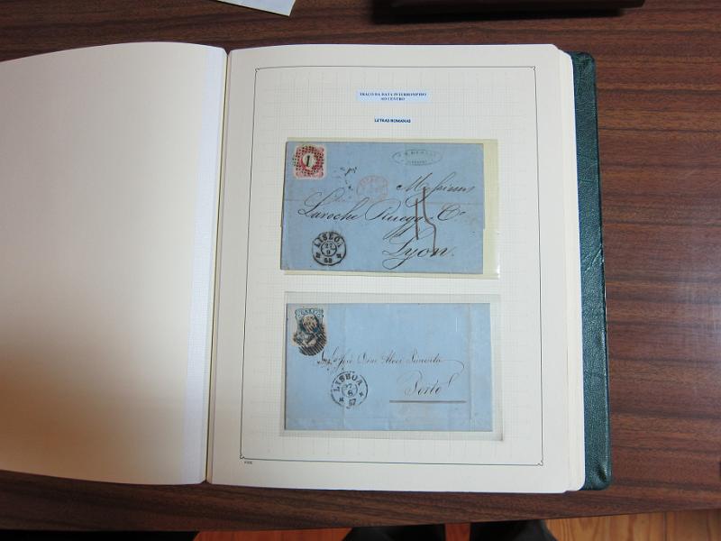 0013 (84).JPG -     Lote:    13      Marcofilia      Lotes Especiais       Descrição:      Portugal.   Colecção especializada em dois álbuns com estudo especializado das marcas de suplo círculo e circulares de Lisboa, com selos de diversas emissões e cartas. Lote a ver.        Lote       Valor Base:     &euro; 1.500,00     Valor Venda:     Retirado     